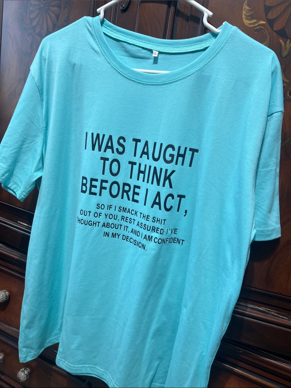 Aqua Graphic Tee with Bold Black Text